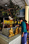 Women praying at Mahamuni Paya, Myanmar 